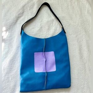 Hand-painted leather wedge bag